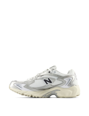 Мужские кроссовки New Balance 725 тканевые серебряного цвета - фото 1 - Miraton