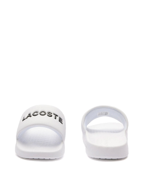 Женские шлепанцы Lacoste резиновые белые - фото 5 - Miraton