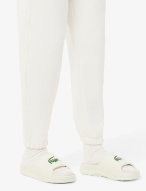 Женские шлепанцы Lacoste резиновые белые - фото 7 - Miraton