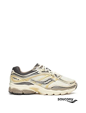 Жіночі кросівки Saucony PROGRID OMNI 9 OG тканинні золотого кольору - фото 1 - Miraton