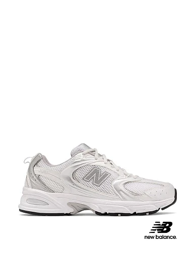 Женские кроссовки New Balance 530 тканевые серебряного цвета - фото 1 - Miraton