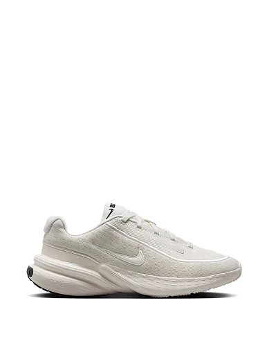 Женские кроссовки Nike Uplift SC Trainers текстильные молочного цвета - фото 1 - Miraton