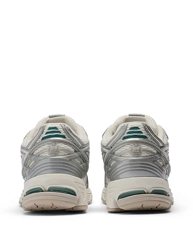 Женские кроссовки New Balance 1906 из экокожи серебряного цвета - фото 4 - Miraton