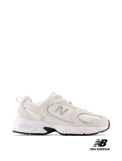Женские кроссовки New Balance 530 тканевые молочного цвета - фото 1 - Miraton