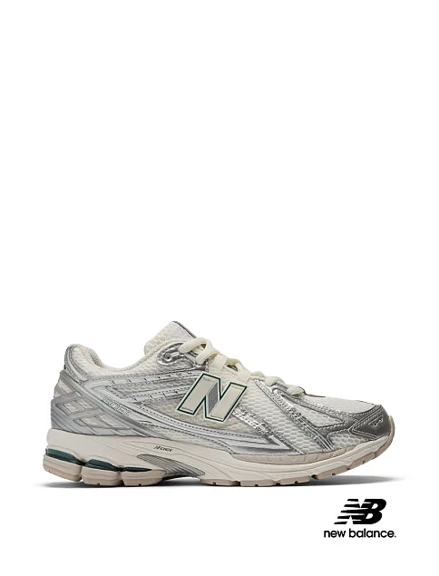 Женские кроссовки New Balance 1906 из экокожи серебряного цвета - фото 1 - Miraton