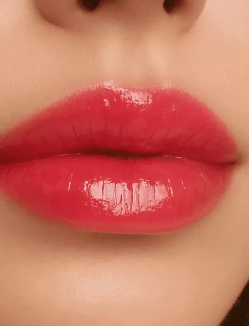 Бальзам-блиск для губ Velvet Coral WiSHLiST Lip Gloss Balsam, 10 мл + Іграшка-брелок - фото 3 - Miraton
