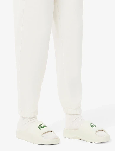 Жіночі шльопанці Lacoste гумові білі - фото 7 - Miraton