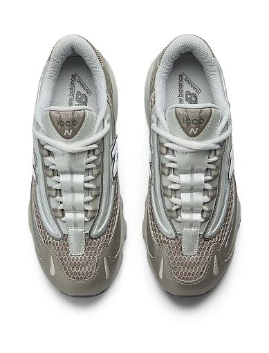 Женские кроссовки New Balance 1000 из экокожи золотого цвета - фото 4 - Miraton